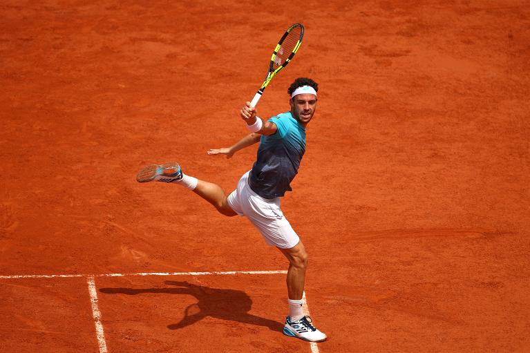 Il finale del rovescio di Cecchinato: bellezza statuaria- Foto Getty Images