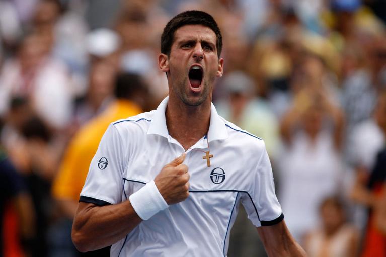 L'esultanza di Novak Djokovic dopo la vittoria su Roger Federer allo US Open 2011 (Getty Images)