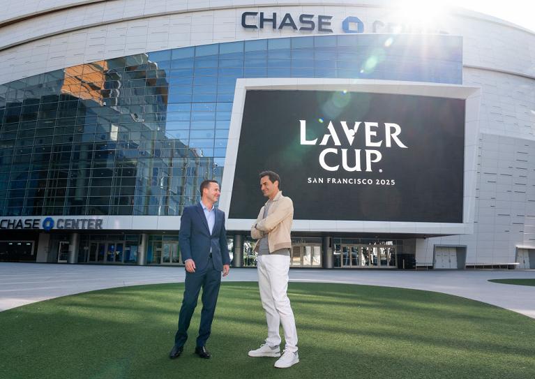 Roger Federer e Brandon Schneider (Getty Images)