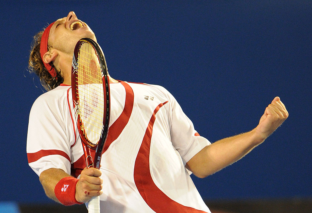 David Nalbandian celebra una delle sue vittorie più emozionanti: 9-7 al quinto contro Hewitt a Melbourne, nel 2011